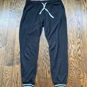 PRE-LOVED CONDITION JOGGERS FROM GARAGE STORE- SIZE SMALL SLIGHTLY OFF - WHITE